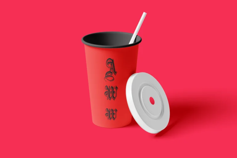 Red paper drink cup with black typography and rim, white straw, and separate white lid