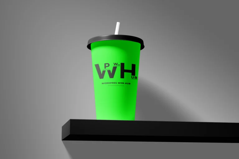 Green paper drink cup with a black lid and white straw displayed on a black shelf