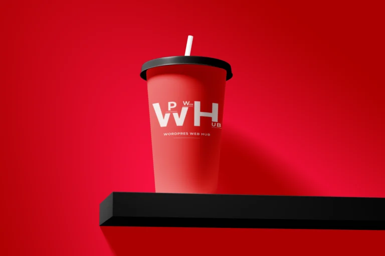 Red paper drink cup with a black lid and white straw displayed on a black shelf