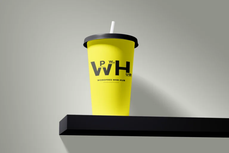 Yellow paper drink cup with a black lid and white straw displayed on a black shelf