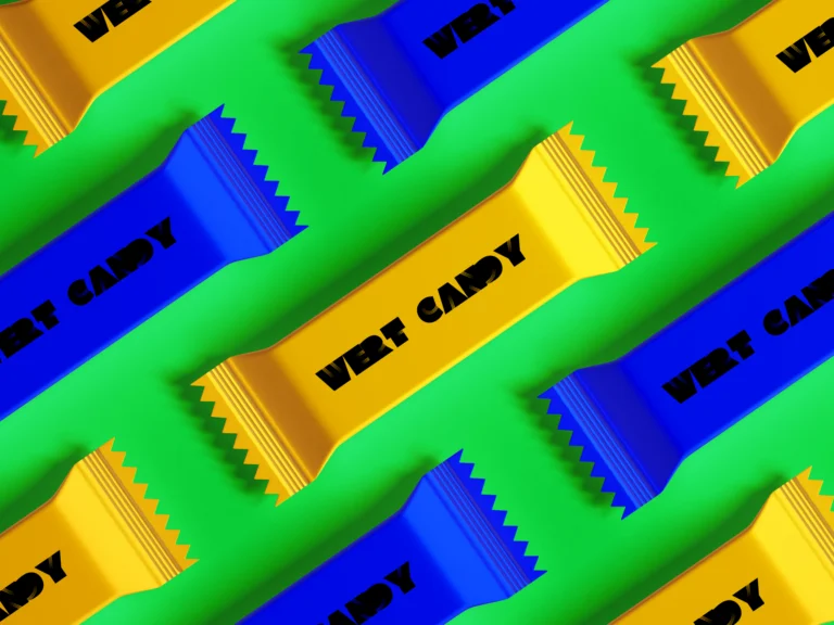 Blue and gold candy bar wrapper mockups on a green background