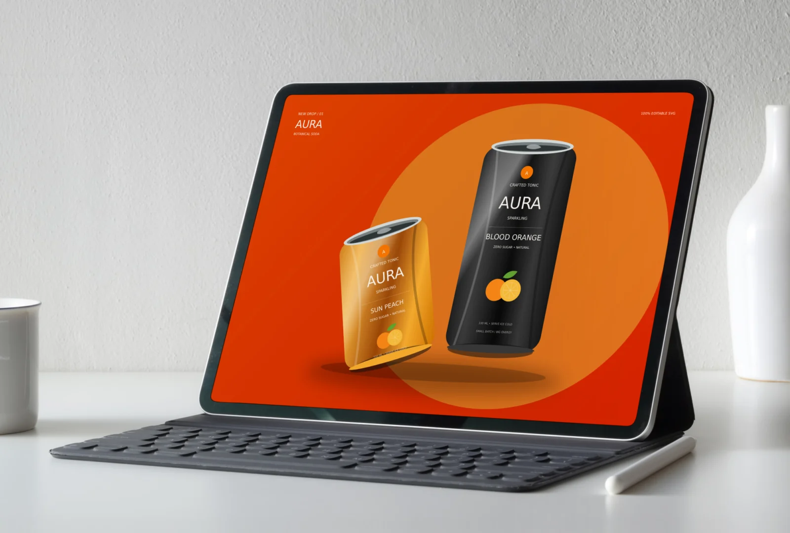Tablet with keyboard mockup displaying orange beverage can packaging designs