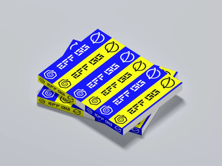 Stack of softcover books with blue and yellow striped cover designs on a light gray background
