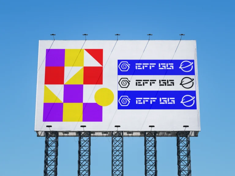 Front view of a large outdoor billboard mockup under a blue sky