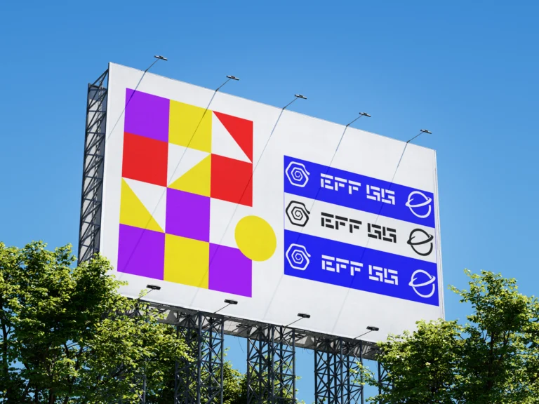 Outdoor billboard mockup above green trees on a sunny day