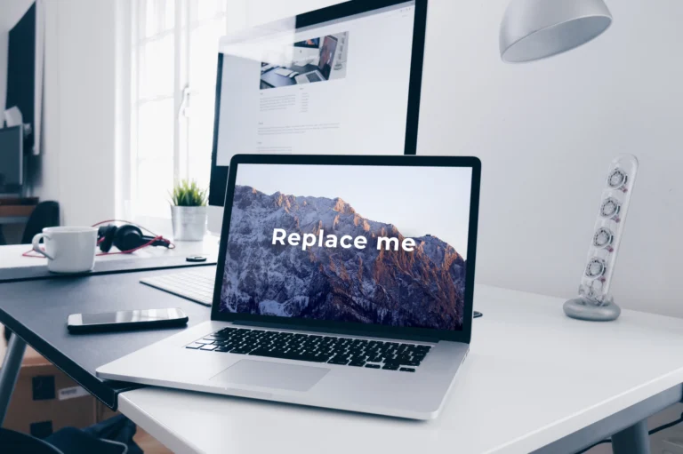 MacBook screen mockup on a bright home office desk